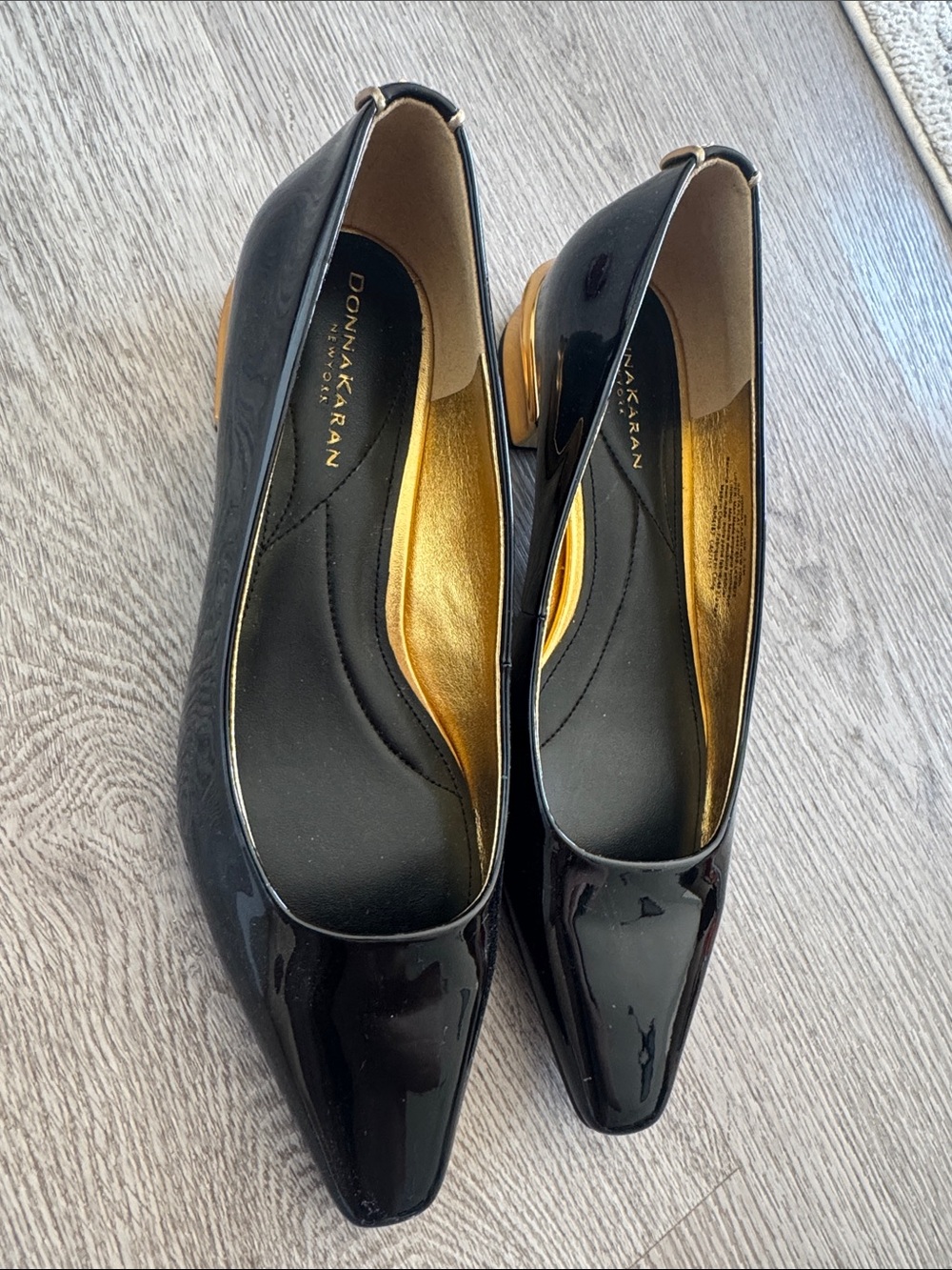 Donna Karan Black Patent Leather Flats with Gold Accents